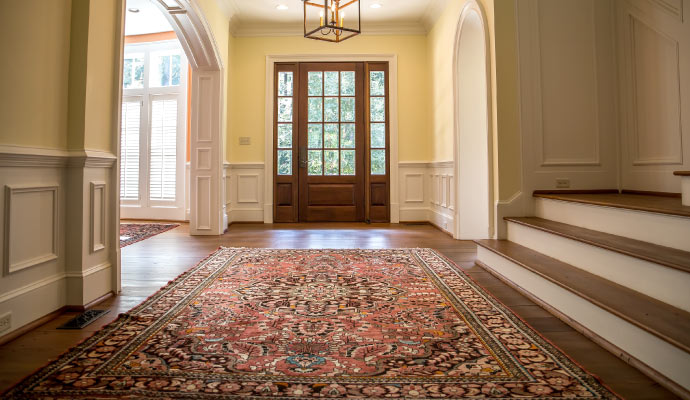 Elegant rug placed on a wooden floor